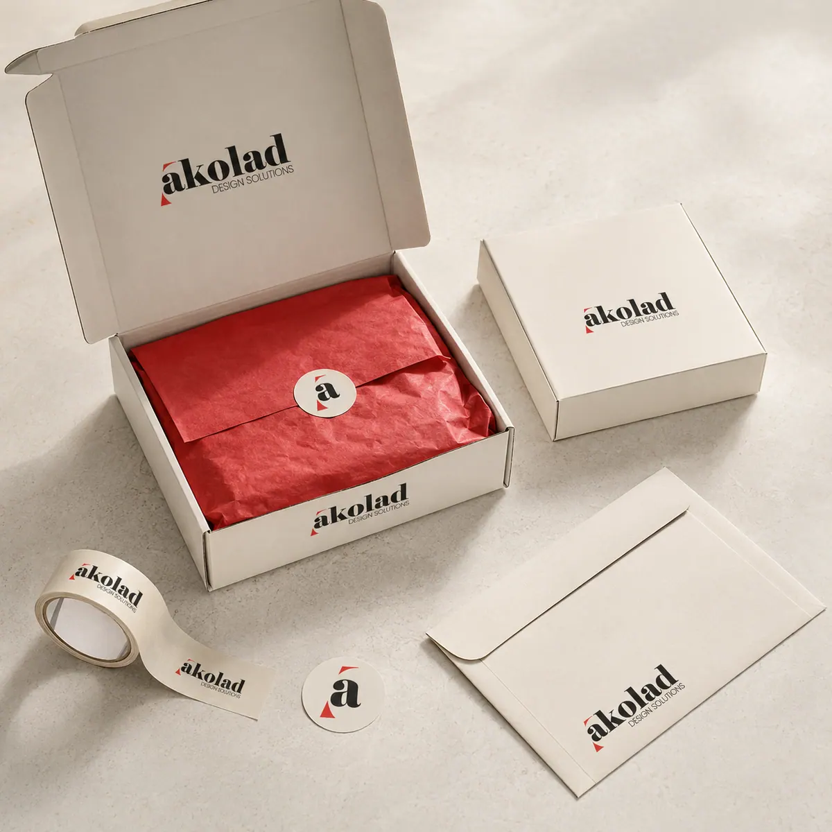 Branded shipping box with tissue, tape and seal.